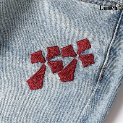 レッドクロス刺繍デニムパンツ